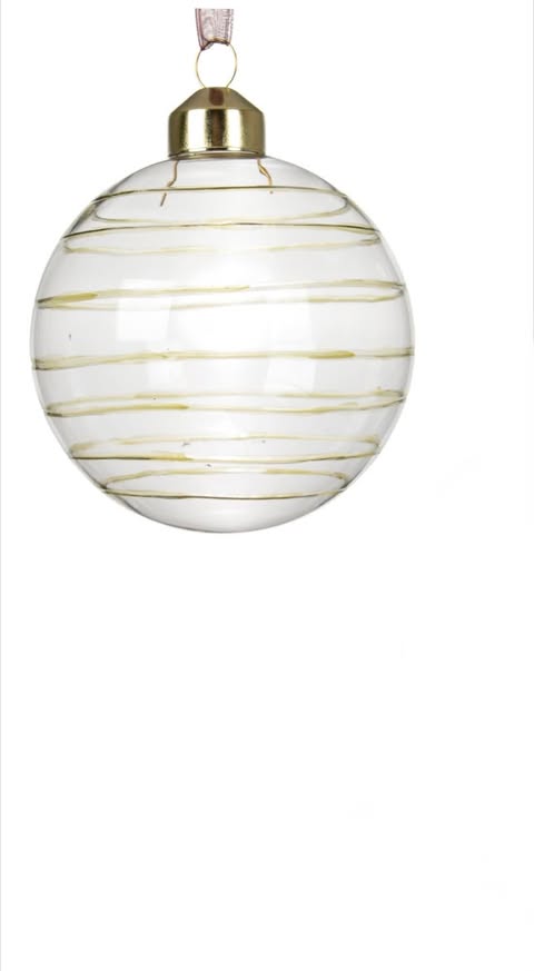 Skleněná ozdoba se zelenými linkami